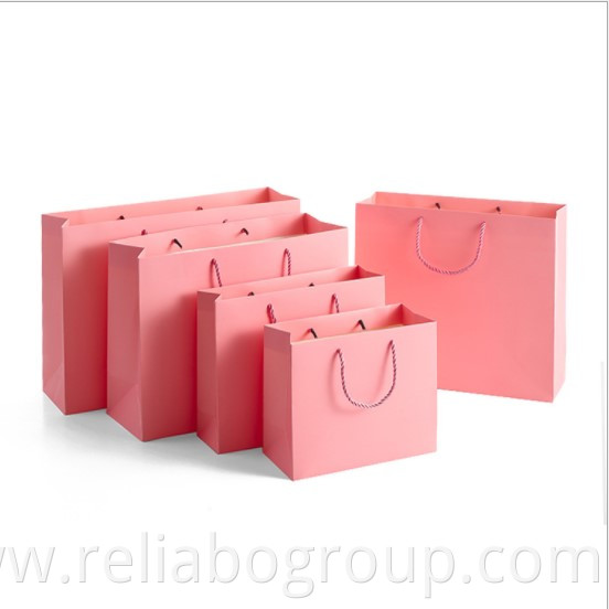 Luxury ribbon handle boutique shopping packaging customized printed euro tote paper gift bags with logo